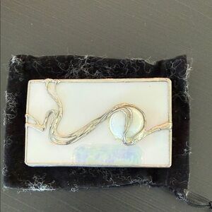 Stylish Silver and White handcrafted mirror.